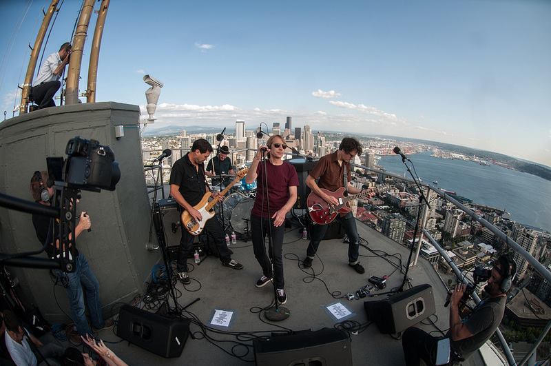 Rock band Mudhoney atop the Space Needle in Seattle Washington.